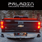 Chevy Silverado 2014–2018 with PSM PALADIN LED tailgate protector. Close up rear view shot with brake lights activated.