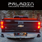 Chevy Silverado 2014–2018 with PSM PALADIN LED tailgate protector. Close up rear view shot with brake lights activated.